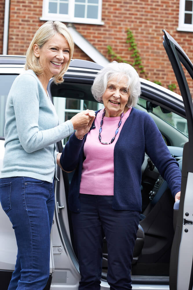 woman-assisting-old-woman-img